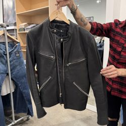 Seven For All Mankind Outlet - Salesman Rob showing me his leather jacket