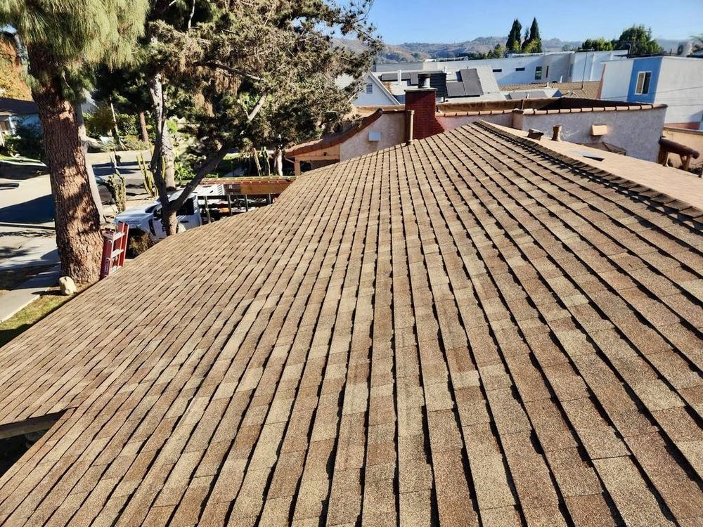 Slide of Economy Roofing