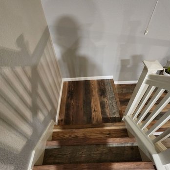 Polo Hardwood Floors - a staircase with a wooden handrail - Flooring Near Me - Oakland, California Polo Hardwood Floors - a staircase with a wooden handrail - Flooring Near Me - Oakland, California