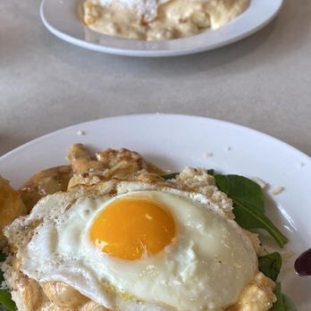 At The Corner - Shrimp & grits in front and sausage gravy & biscuits in background - Salad Near Me - Little Rock, Arkansas At The Corner - Shrimp & grits in front and sausage gravy & biscuits in background - Salad Near Me - Little Rock, Arkansas