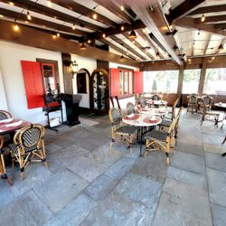 Jacques' Brasserie - Entrance to the interior. This is the covered front porch.