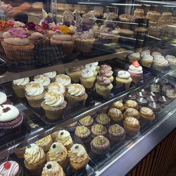 Dos Chris’ Bakery & Charcuterie - cupcake display - Bakeries Near Me - Phoenix, Arizona