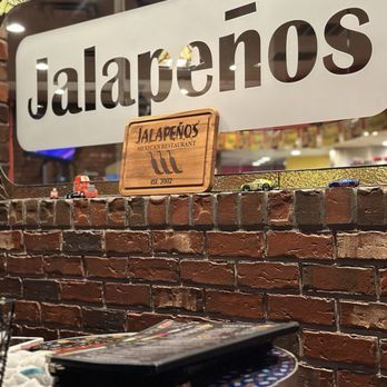 Jalapeños - a laptop on a table - Mexican Near Me - Chester, Virginia