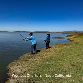Wombat Charters - Showing my wife how to cast - Fishing Near Me Wombat Charters - Showing my wife how to cast - Fishing Near Me