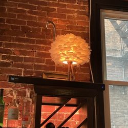 Radici Kitchen & Bar - Cool ostrich light with cheap ass sound bar.