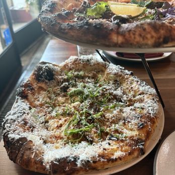 Hearth Restaurant & Coffee - Mushroom Pizza on the bottom, Short Rib pizza on the top - Latin American Near Me - Moorpark, California