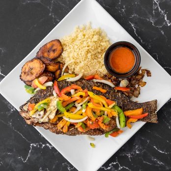 Famous 4 African Restaurant - Attieke with Tilapia and Seasoned Veggies - African Near Me - Columbus, Ohio Famous 4 African Restaurant - Attieke with Tilapia and Seasoned Veggies - African Near Me - Columbus, Ohio