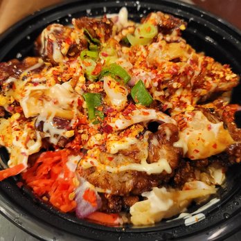 DokoDemo - a close up of a bowl of food - Ramen Near Me - New York, New York