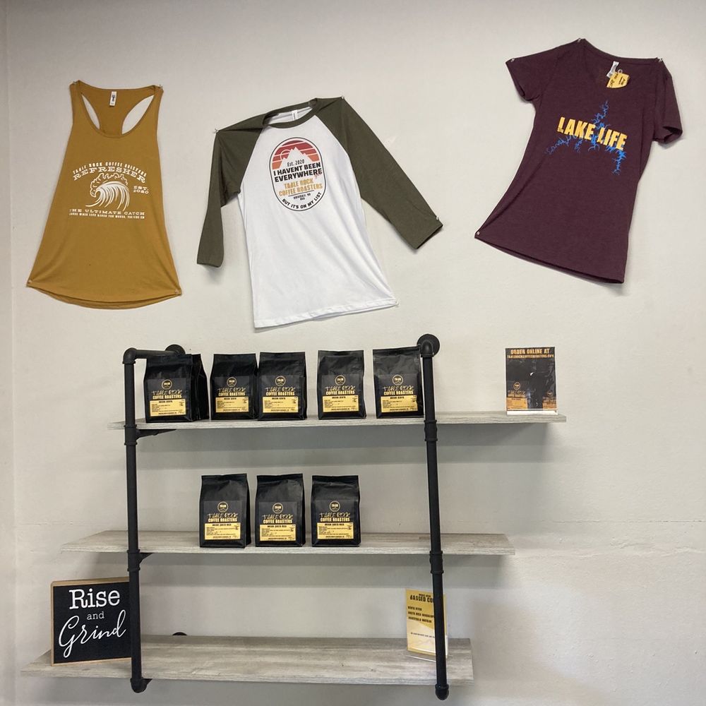 Table Rock Coffee Roasters - a display of t - shirts - Coffee Roasteries Near Me - Branson, Missouri Table Rock Coffee Roasters - a display of t - shirts - Coffee Roasteries Near Me - Branson, Missouri