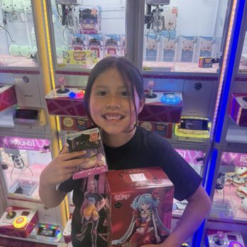 Round1 Bowling & Arcade - Temecula - Daughter claiming prizes - Bowling Near Me - Temecula, California