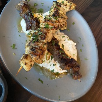 Postino Broadway - Chicken and beef skewers with yogurt sauce yasss - Wine Bars Near Me - Denver, Colorado Postino Broadway - Chicken and beef skewers with yogurt sauce yasss - Wine Bars Near Me - Denver, Colorado