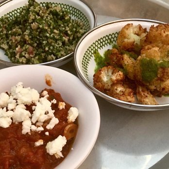 Rina - 3 mezze: tabouleh (back), cauliflower (right), eggplant mattboucha (front) - Middle Eastern Near Me - Atlanta, Georgia Rina - 3 mezze: tabouleh (back), cauliflower (right), eggplant mattboucha (front) - Middle Eastern Near Me - Atlanta, Georgia