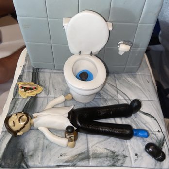 Amazing Cakes and Creations - a toilet and toilet paper - Bakeries Near Me - Key West, Florida