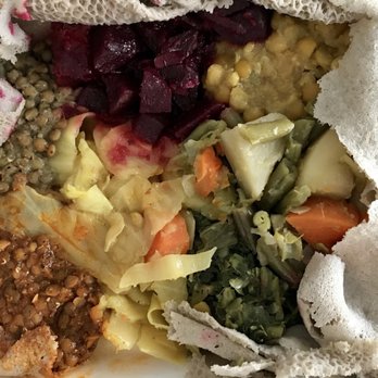 Lalibela Ethiopian Restaurant - Vegetarian platter to go on GF Tef injera - Ethiopian Near Me - Toronto, Ontario Lalibela Ethiopian Restaurant - Vegetarian platter to go on GF Tef injera - Ethiopian Near Me - Toronto, Ontario