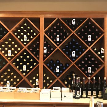 Nevada City Winery - a wine rack full of wine bottles - Wineries Near Me - Nevada City, California Nevada City Winery - a wine rack full of wine bottles - Wineries Near Me - Nevada City, California