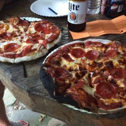 Pollywogg Holler - Yummy. $8 for cheese. $10-12 for other toppings.