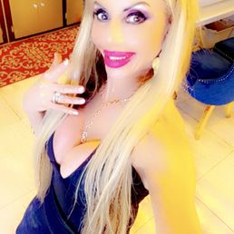 Me with my French manicure leaving for Paris. I have my nails done with coco they are all fantastic. It's very clean a