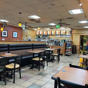 Subway - the inside of a restaurant with tables and booths - Sandwiches Near Me - Graniteville, South Carolina
