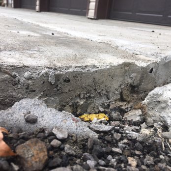 Fidurko Brothers Construction - Example of poor edging, and note the dip/valley where the pads meet. Concrete colors are different as well. - Masonry/Concrete Near Me