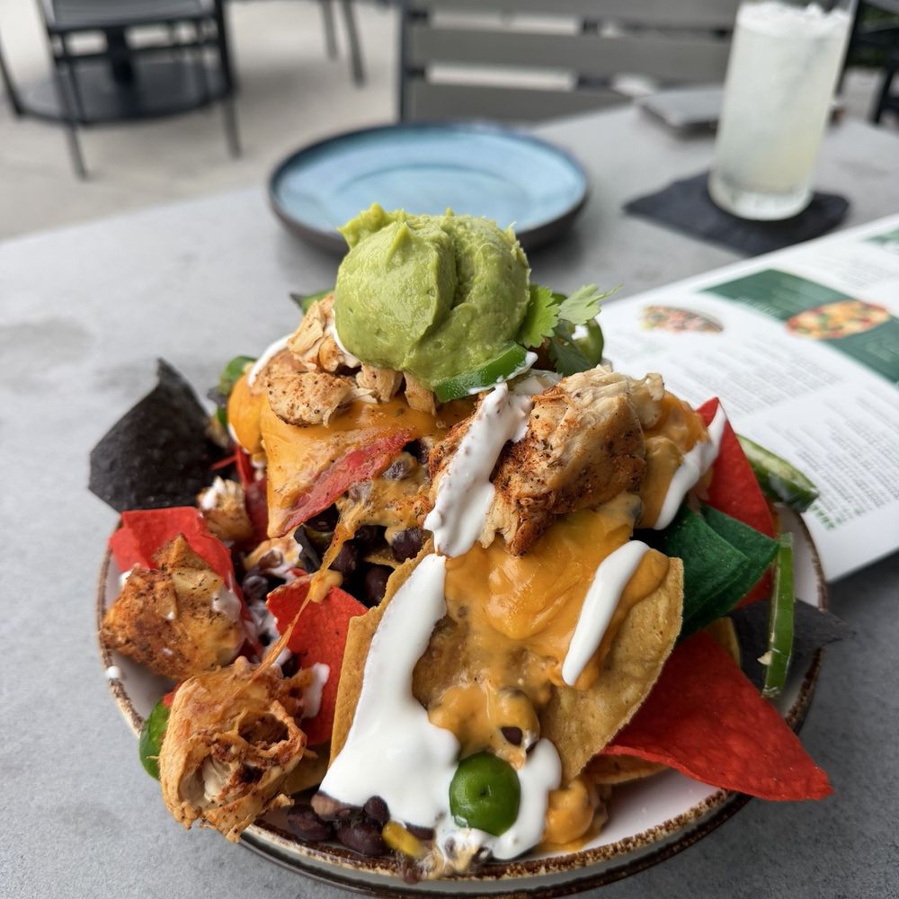 The Greene Turtle - Loaded nachos with chicken - American Near Me - Tampa Bay, Florida The Greene Turtle - Loaded nachos with chicken - American Near Me - Tampa Bay, Florida