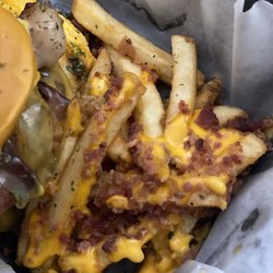 Happy Burger - Burger and fries.