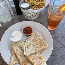 Cheese quesadilla, fries, aperol spritz Cheese quesadilla, fries, aperol spritz
