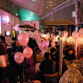 Hama Sushi - the patio area plays surf movies projected onto the walls - Sushi Bars Near Me - Venice, California Hama Sushi - the patio area plays surf movies projected onto the walls - Sushi Bars Near Me - Venice, California