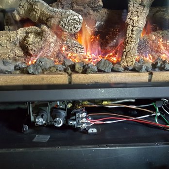 Ashtree AC & Chimney - With the aid of great equipment we clean, serviced, and inspected this fireplace. Love the embered look of the burners on the gas inserts - Chimney Sweeps Near Me - Fresno, California Ashtree AC & Chimney - With the aid of great equipment we clean, serviced, and inspected this fireplace. Love the embered look of the burners on the gas inserts - Chimney Sweeps Near Me - Fresno, California