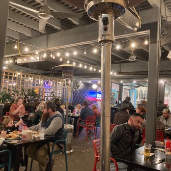 Burger Burger - people sitting at tables in a restaurant - Burgers Near Me - Fredericksburg, Texas