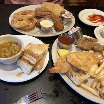 Herby-K's - Catfish platter and shrimp buster (photo taken after we shared our plates) with fries and hush puppies and a bowl of etoufee. - Cajun/Creole Near Me - Shreveport, Louisiana Herby-K's - Catfish platter and shrimp buster (photo taken after we shared our plates) with fries and hush puppies and a bowl of etoufee. - Cajun/Creole Near Me - Shreveport, Louisiana
