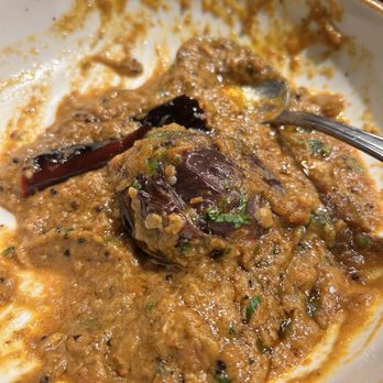 Royal Southern Kitchen - Whats left of (Ennai Kathirikai)stewed whole Indian eggplant mixed w/spices served with your choice basmati or string hoppers - Indian Near Me - Winter Park, Florida