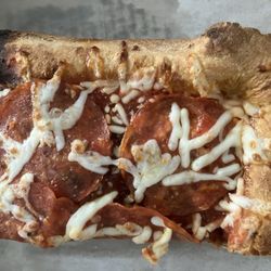 Isn't pizza supposed to have more than six shreds of cheese on it? Absolutely ridiculous!