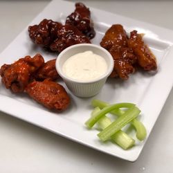 Delizioso Brick Oven Pizza - Fried wings in our choice of sauce (BBQ, sweet chili oh Buffalo)