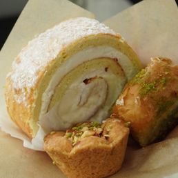 Coconut roulette, nut tart, and baklava