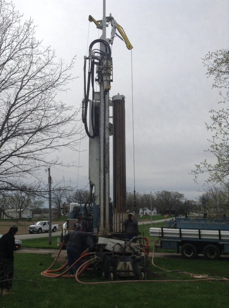 Slide of Hall & Sons Well Drilling