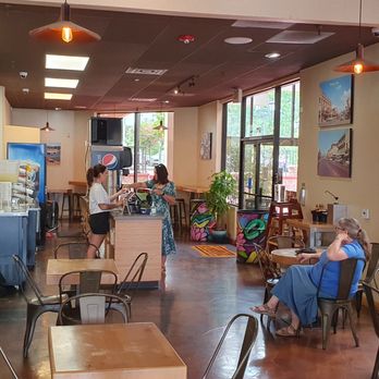 Wilda's Grill - a woman sitting at a table - Hot Dogs Near Me - Redding, California