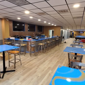 Draft Daze - tables and chairs in a restaurant - Sports Bars Near Me - Fayetteville, North Carolina Draft Daze - tables and chairs in a restaurant - Sports Bars Near Me - Fayetteville, North Carolina