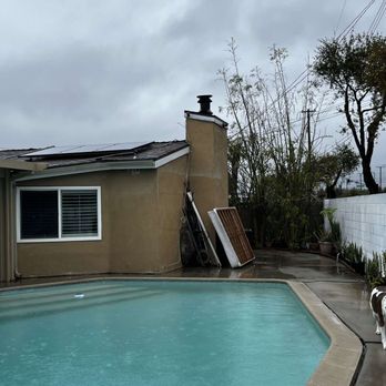 AMECO Solar & Roofing - Outside picture of living room area. - Solar Installation Near Me - Paramount, California