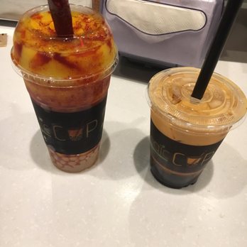 Magic Cup - Cha Mango on the left and Thai Tea Boba on the right! - Coffee & Tea Near Me - Richardson, Texas Magic Cup - Cha Mango on the left and Thai Tea Boba on the right! - Coffee & Tea Near Me - Richardson, Texas