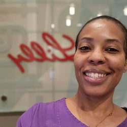 Benevolence Massage and Spa - Me at Eli Lilly before doing chair massages for the staff
