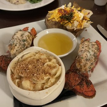 Meritage - Twin Lobster Tails in the forefront. Filet Mignon in the background. - New American Near Me - Cincinnati, Ohio Meritage - Twin Lobster Tails in the forefront. Filet Mignon in the background. - New American Near Me - Cincinnati, Ohio