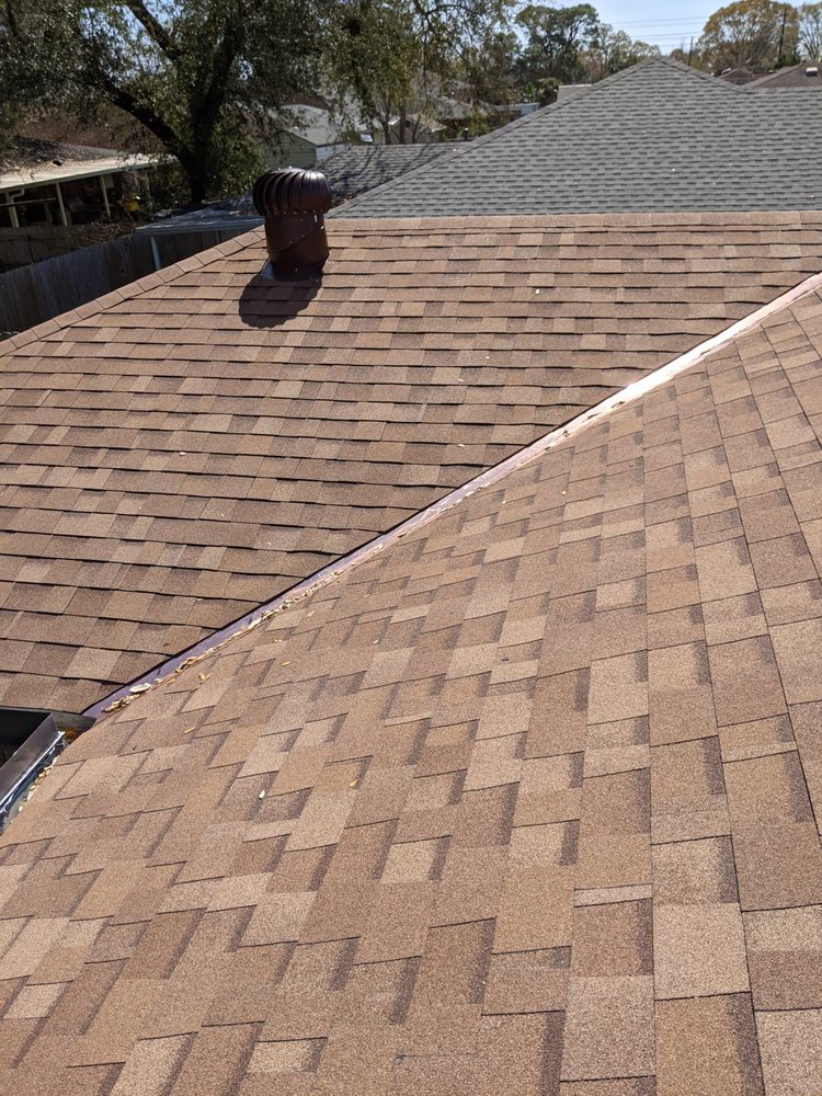 Slide of Above Standard Roofing