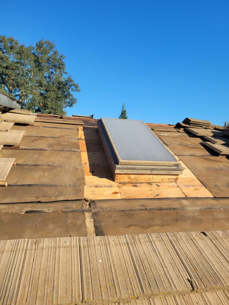 Slide of Rouse Roofing