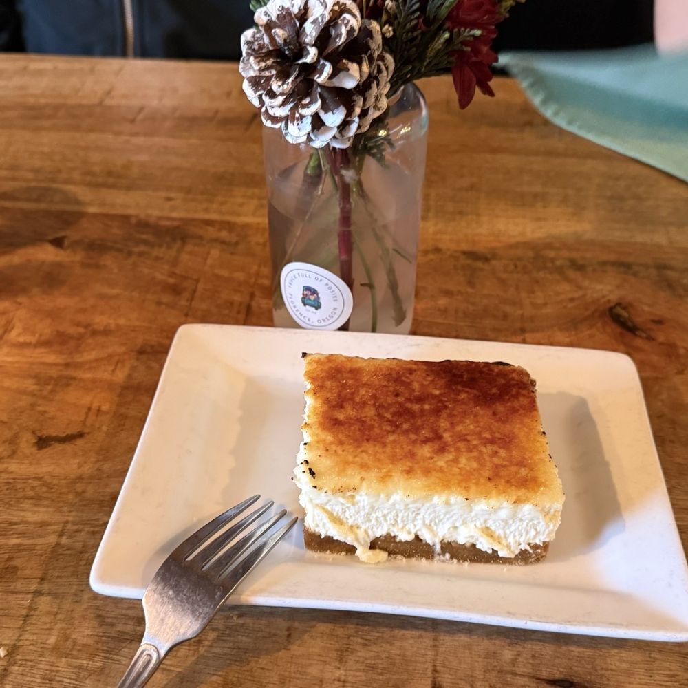 Nosh Eatery - Brulee Goat Cheese Cheesecake - New American Near Me - Florence, Oregon Nosh Eatery - Brulee Goat Cheese Cheesecake - New American Near Me - Florence, Oregon