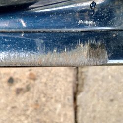 Clarkston Auto Body & Towing - Paint is scraped off because door is dropping and scraping across the bottom of the door frame every time I open and close it.