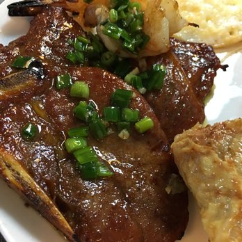 Pho #1 - The thin-cout pork chop is deeply marinated in soy with five-spice. - Vietnamese Near Me - Sunnyvale, California Pho #1 - The thin-cout pork chop is deeply marinated in soy with five-spice. - Vietnamese Near Me - Sunnyvale, California