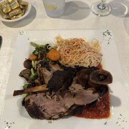 Ossobucco and chicken with veggies which Ossobucco and chicken with veggies which