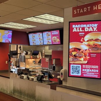 Wendy's - a menu and a counter in a fast food restaurant - Burgers Near Me - Carrollton, Texas Wendy's - a menu and a counter in a fast food restaurant - Burgers Near Me - Carrollton, Texas