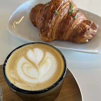 Sweet Bloom Coffee Roasters - oatmilk cortado, gochujang croissant - Coffee & Tea Near Me - Westminster, Colorado Sweet Bloom Coffee Roasters - oatmilk cortado, gochujang croissant - Coffee & Tea Near Me - Westminster, Colorado
