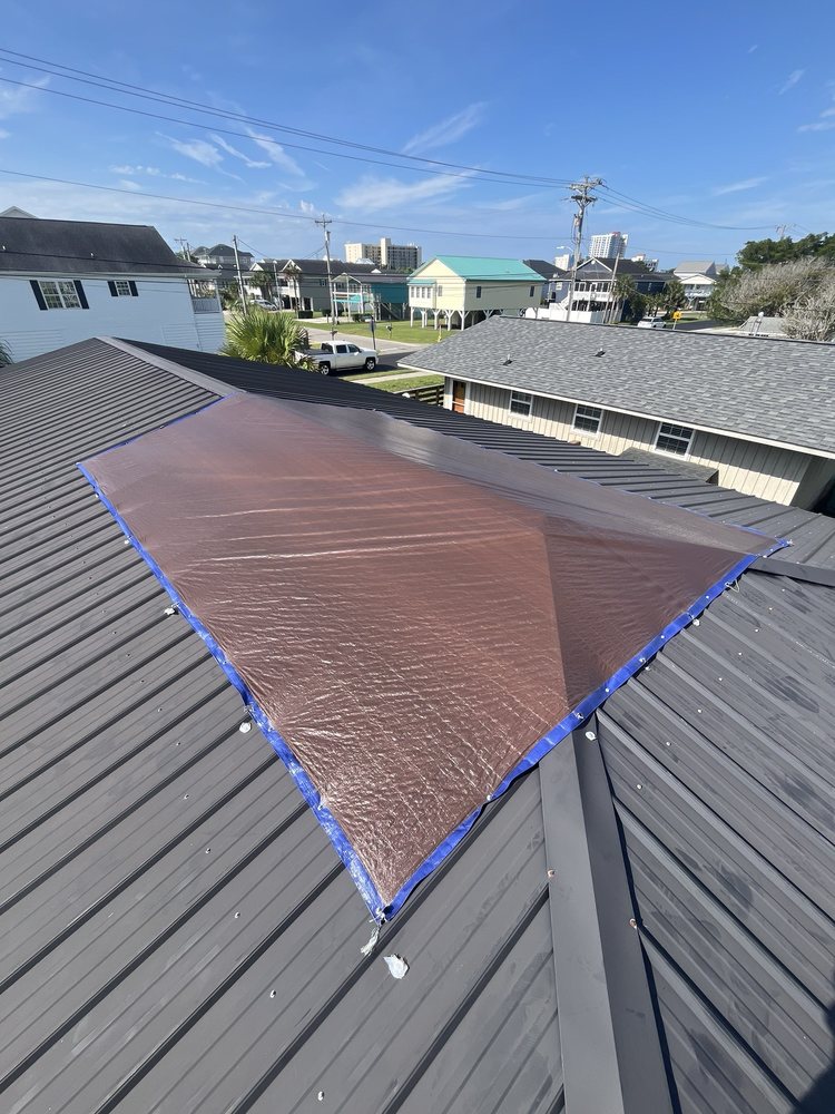 Slide of Linta Roofing